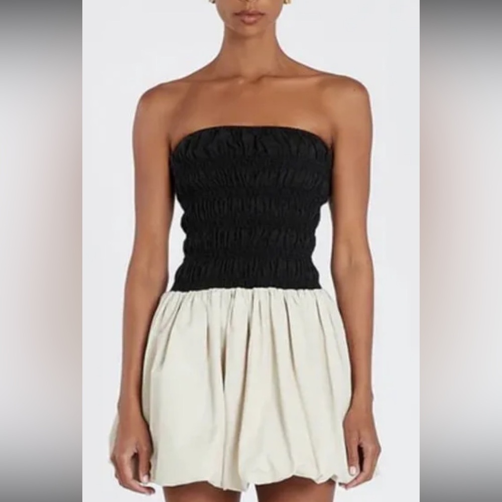 Brand new mini dress from Dissh, with tags, size 10.